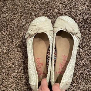 cream and tan lace flats